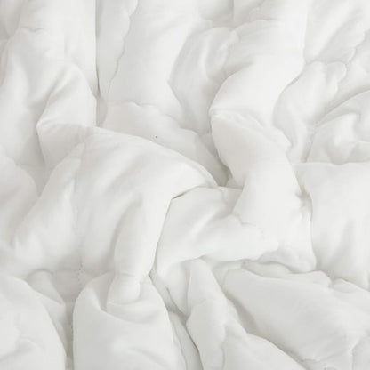 NTBAY Down Alternative Toddler Comforter, Lightweight and Warm Solid Color Baby Crib Quilted Blanket, 39x47 inches, White