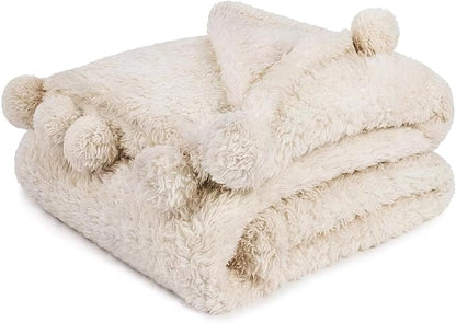 PAVILIA Cream Sherpa Throw Blanket for Couch, Warm Plush Pom Pom Blanket Throw, Ivory Fuzzy Sofa Throw, Lightweight Soft Cozy Fluffy Blanket with Pom Poms, Beige, 50x60