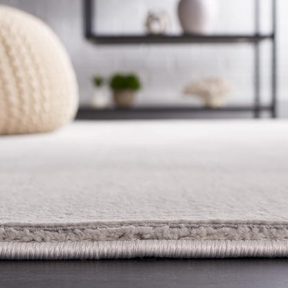 SAFAVIEH Revive Collection Area Rug - 7' x 10', Grey, Geometric Design, Ideal for High Traffic Areas in Living Room, Bedroom, Dining (REV102F)