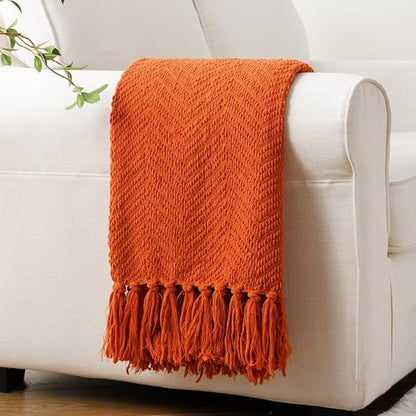 BATTILO HOME Burnt Orange Throw Blanket for Couch, Knit Fall Decor Blanket Versatile for Chair, Decorative Halloween Blanket with Tassels for Twin Bed, 60" x 80"