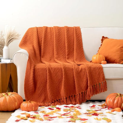 BATTILO HOME Burnt Orange Throw Blanket for Couch, Knit Fall Decor Blanket Versatile for Chair, Decorative Halloween Blanket with Tassels for Twin Bed, 60" x 80"