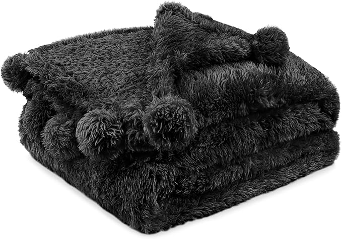 PAVILIA Black Sherpa Throw Blanket for Couch, Warm Plush Pom Pom Throw, Fuzzy Sofa Blanket, Lightweight Soft Cozy Fluffy With Pom Poms, 50x60