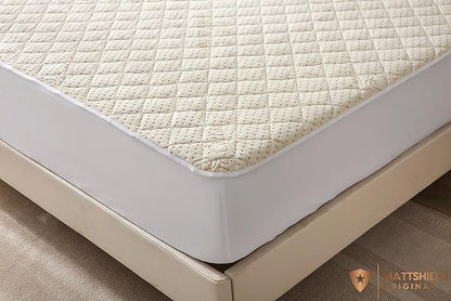 Crib Luxury Quilted Organic Mattress Protector Pad - Certified Organic Cotton, Waterproof Skin-Friendly Breathable Mattress Cover - Premium 380 GSM Comfort - Jersey Cotton Skirt