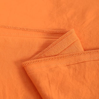 NTBAY Toddler Bedding Set - 4 Piece Soft and Breathable Crib Bedding Set for Boys and Girls, Includes Quilted Comforter, Fitted Sheet, Flat Top Sheet and Envelope Pillowcase, Orange