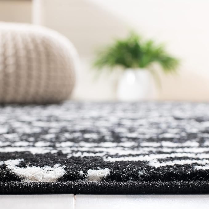 SAFAVIEH Tulum Collection Area Rug - 8' Round, Black & Ivory, Moroccan Boho Tribal Design, Non-Shedding & Easy to Clean, Ideal for Living Room, Bedroom, Dining Space (TUL272Z)