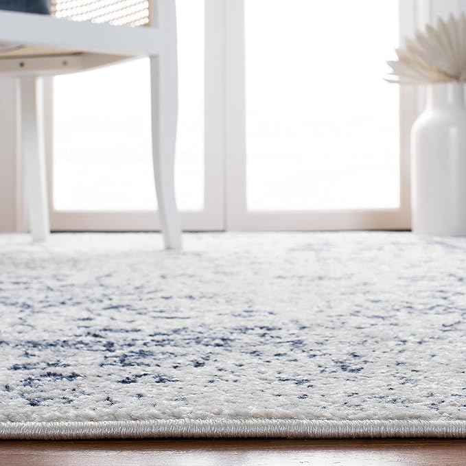 SAFAVIEH Area Rug 8x10 - Adirondack Collection - Large - Ivory & Navy, Distressed Vintage Floral Design, Non-Shedding & Easy Cleaning, Ideal for Living Room, Bedroom, Dining Space (ADR109M)