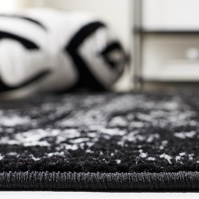 SAFAVIEH Adirondack Collection Area Rug - 6' Round, Black & Ivory, Distressed Vintage Floral Design, Non-Shedding & Easy to Clean, Ideal for Living Room, Bedroom, Dining Space (ADR109Z)