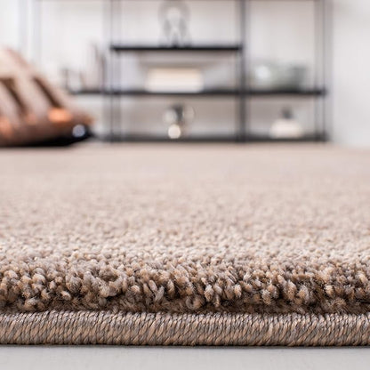 SAFAVIEH Plain and Solid Collection Area Rug - 5'5" x 7'7", Taupe, Non-Shedding & Easy Care, Ideal for High Traffic Areas in Living Room, Bedroom (PNS320-4429)