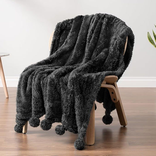 PAVILIA Black Sherpa Throw Blanket for Couch, Warm Plush Pom Pom Throw, Fuzzy Sofa Blanket, Lightweight Soft Cozy Fluffy With Pom Poms, 50x60