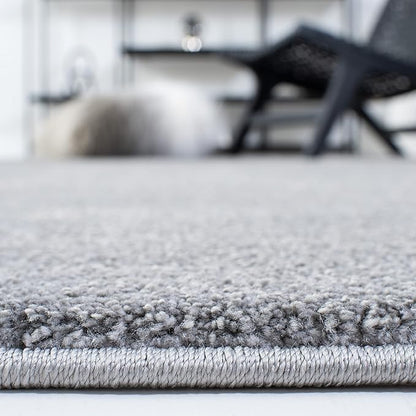 SAFAVIEH Plain and Solid Collection Accent Rug - 4'5" x 6'5", Grey, Non-Shedding & Easy Care, Ideal for High Traffic Areas in Entryway, Living Room, Bedroom (PNS320-4410)