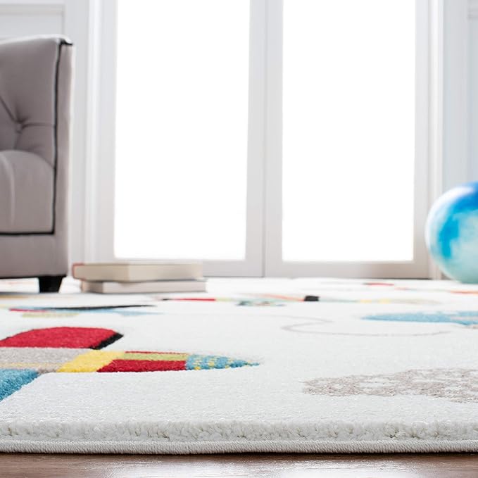 SAFAVIEH Carousel Kids Collection Accent Rug - 3'3" x 5'3", Ivory & Blue, Non-Shedding & Easy Care, Ideal for High Traffic Areas for Boys & Girls in Playroom, Nursery, Bedroom (CRK167A)