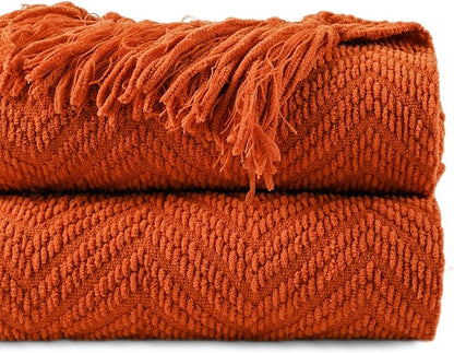BATTILO HOME Burnt Orange Throw Blanket for Couch, Knit Fall Decor Blanket Versatile for Chair, Decorative Halloween Blanket with Tassels for Twin Bed, 60" x 80"