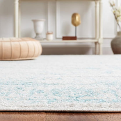 SAFAVIEH Adirondack Collection Area Rug - 5'1" x 7'6", Ivory & Light Blue, Distressed Vintage Floral Design, Non-Shedding & Easy to Clean, Ideal for Living Room, Bedroom, Dining Space (ADR109L)