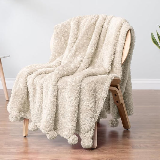 PAVILIA Cream Sherpa Throw Blanket for Couch, Warm Plush Pom Pom Blanket Throw, Ivory Fuzzy Sofa Throw, Lightweight Soft Cozy Fluffy Blanket with Pom Poms, Beige, 50x60