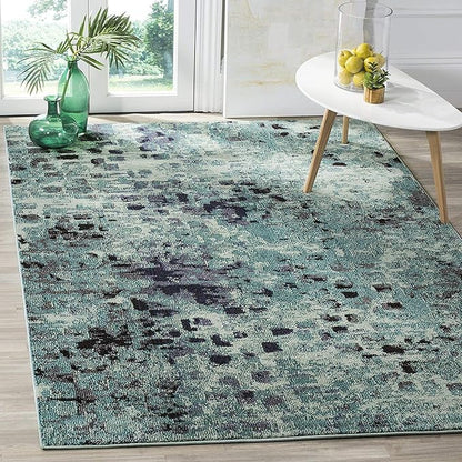 SAFAVIEH Monaco Collection Area Rug - 5'1" x 7'7", Light Blue & Multi, Boho Chic Abstract Watercolor Design, Non-Shedding & Easy Care, Ideal for High Traffic Areas in Living Room, Bedroom (MNC225J)