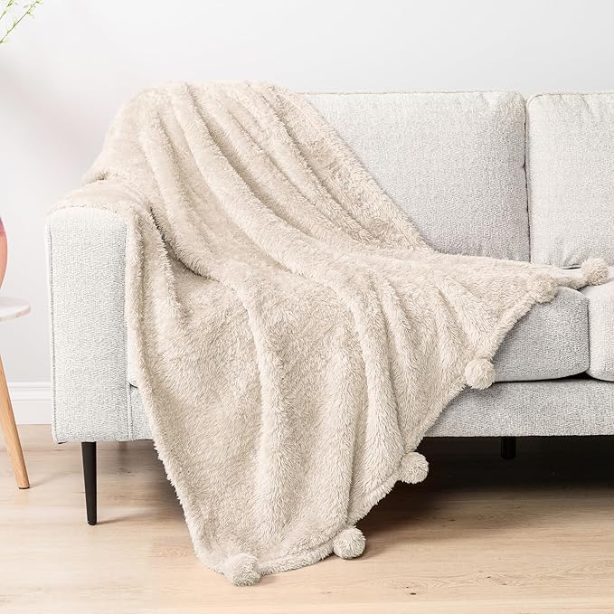 PAVILIA Cream Sherpa Throw Blanket for Couch, Warm Plush Pom Pom Blanket Throw, Ivory Fuzzy Sofa Throw, Lightweight Soft Cozy Fluffy Blanket with Pom Poms, Beige, 50x60