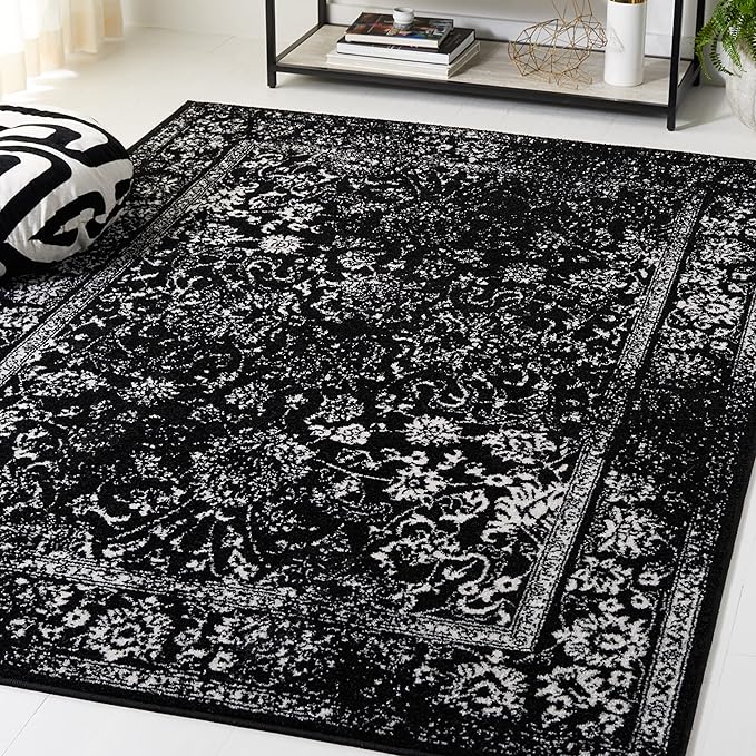 SAFAVIEH Adirondack Collection Area Rug - 5'1" x 7'6", Black & Ivory, Distressed Vintage Floral Design, Non-Shedding & Easy to Clean, Ideal for Living Room, Bedroom, Dining Space (ADR109Z)