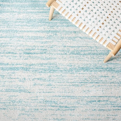SAFAVIEH Adirondack Collection Accent Rug - 4'5" x 6'5", Aqua & Ivory, Modern Ombre Design, Non Shedding & Easy to Clean, Ideal for Living Room, Bedroom, Office, Dining Space (ADR113J)