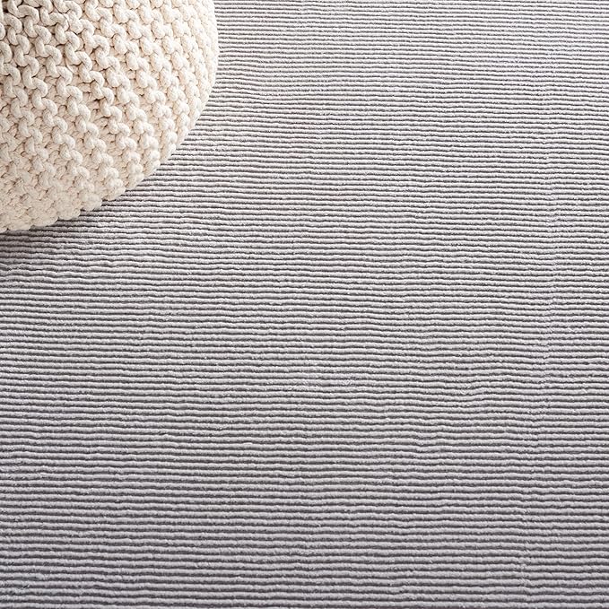 SAFAVIEH Revive Collection Area Rug - 6'7" x 9', Grey, Solid Design, Non-Shedding & Easy Care, Ideal for High Traffic Areas in Living Room, Bedroom, Dining (REV102F-6)