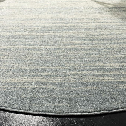 SAFAVIEH Adirondack Collection Area Rug - 6' Round, Ivory & Silver, Modern Ombre Design, Non Shedding & Easy to Clean, Ideal for Living Room, Bedroom, Office, Dining Space (ADR113B)