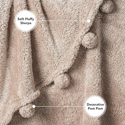 PAVILIA Taupe Sherpa Throw Blanket for Couch, Warm Plush Pom Pom Blanket Throw, Tan Fuzzy Sofa Throw, Lightweight Soft Cozy Fluffy Blanket with Pom Poms, Light Brown, 50x60