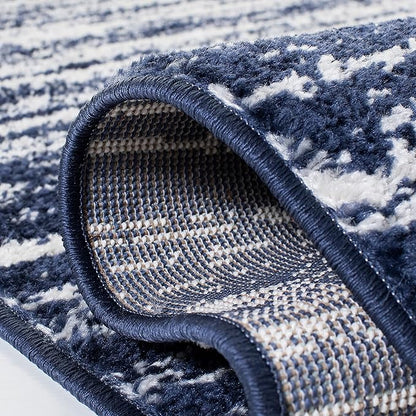 SAFAVIEH Adirondack Collection Area Rug - 5'5" x 7'7", Navy & Ivory, Modern Ombre Design, Non Shedding & Easy to Clean, Ideal for Living Room, Bedroom, Office, Dining Space (ADR113N)