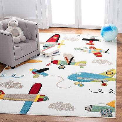 SAFAVIEH Carousel Kids Collection Accent Rug - 3'3" x 5'3", Ivory & Blue, Non-Shedding & Easy Care, Ideal for High Traffic Areas for Boys & Girls in Playroom, Nursery, Bedroom (CRK167A)