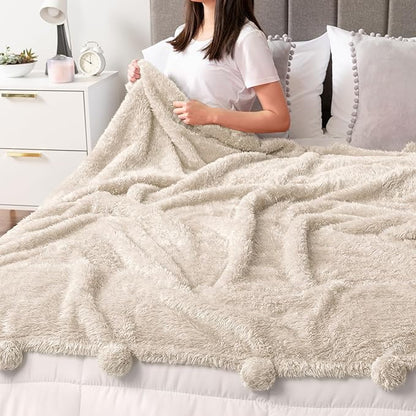 PAVILIA Cream Sherpa Throw Blanket for Couch, Warm Plush Pom Pom Blanket Throw, Ivory Fuzzy Sofa Throw, Lightweight Soft Cozy Fluffy Blanket with Pom Poms, Beige, 50x60