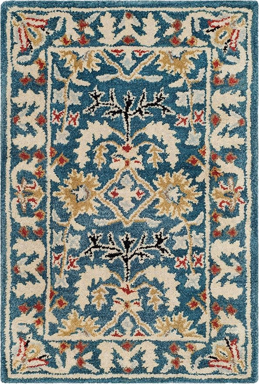 SAFAVIEH Antiquity Collection Accent Rug - 2'3" x 4', Dark Blue & Multi, Handmade Traditional Oriental Wool, Ideal for High Traffic Areas in Entryway, Living Room, Bedroom (AT64B)