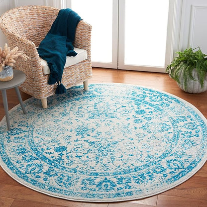 SAFAVIEH Adirondack Collection Area Rug - 6' Round, Ivory & Teal, Distressed Vintage Floral Design, Non-Shedding & Easy to Clean, Ideal for Living Room, Bedroom, Dining Space (ADR109D)