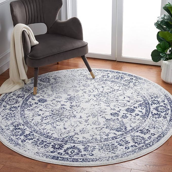 SAFAVIEH Adirondack Collection Area Rug - 6' Round, Ivory & Navy, Distressed Vintage Floral Design, Non-Shedding & Easy to Clean, Ideal for Living Room, Bedroom, Dining Space (ADR109M)