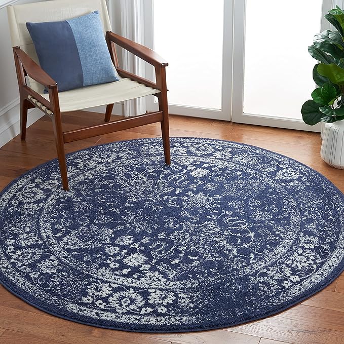 SAFAVIEH Adirondack Collection Area Rug - 4' Round, Navy & Ivory, Distressed Vintage Floral Design, Non-Shedding & Easy to Clean, Ideal for Living Room, Bedroom, Dining Space (ADR109N)
