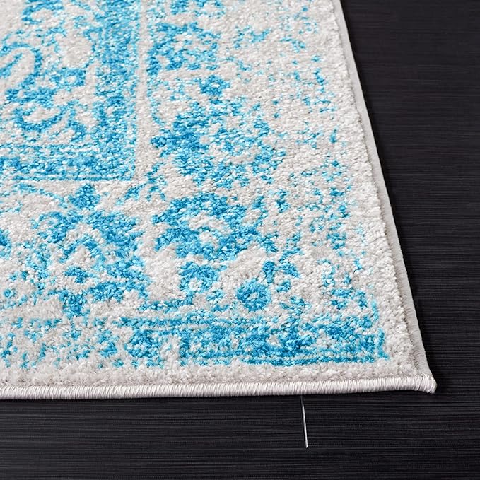 SAFAVIEH Adirondack Collection Area Rug - 5'1" x 7'6", Ivory & Teal, Distressed Vintage Floral Design, Non-Shedding & Easy to Clean, Ideal for Living Room, Bedroom, Dining Space (ADR109D)