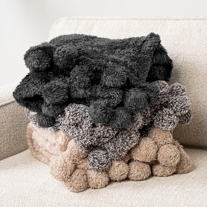 PAVILIA Black Sherpa Throw Blanket for Couch, Warm Plush Pom Pom Throw, Fuzzy Sofa Blanket, Lightweight Soft Cozy Fluffy With Pom Poms, 50x60