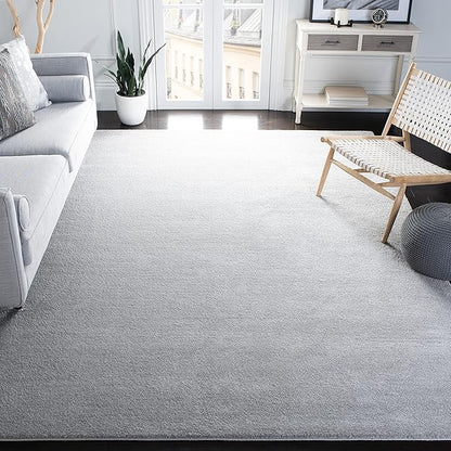 SAFAVIEH Plain and Solid Collection Area Rug - 6'7" x 9', Light Grey, Non-Shedding & Easy Care, Ideal for High Traffic Areas in Living Room, Bedroom (PNS320-4424)