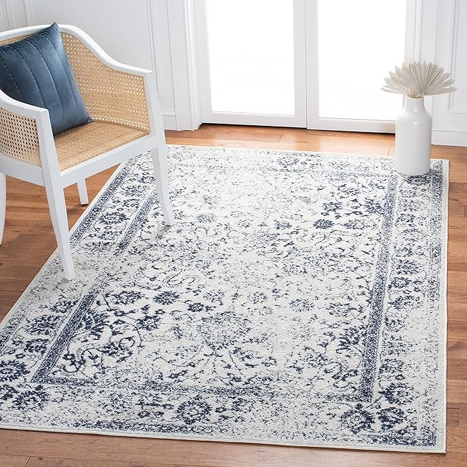 SAFAVIEH Adirondack Collection Area Rug - 5'1" x 7'6", Ivory & Navy, Distressed Vintage Floral Design, Non-Shedding & Easy to Clean, Ideal for Living Room, Bedroom, Dining Space (ADR109M)