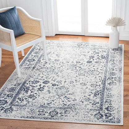 SAFAVIEH Adirondack Collection Area Rug - 5'1" x 7'6", Ivory & Navy, Distressed Vintage Floral Design, Non-Shedding & Easy to Clean, Ideal for Living Room, Bedroom, Dining Space (ADR109M)