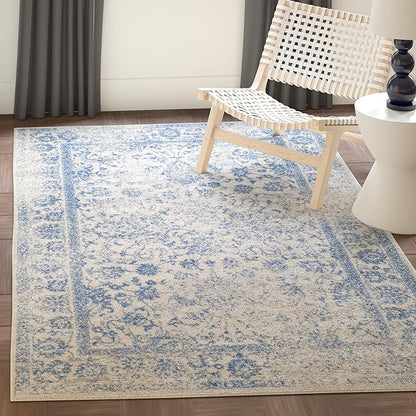 SAFAVIEH Adirondack Collection Area Rug - 5'1" x 7'6", Ivory & Light Blue, Distressed Vintage Floral Design, Non-Shedding & Easy to Clean, Ideal for Living Room, Bedroom, Dining Space (ADR109L)