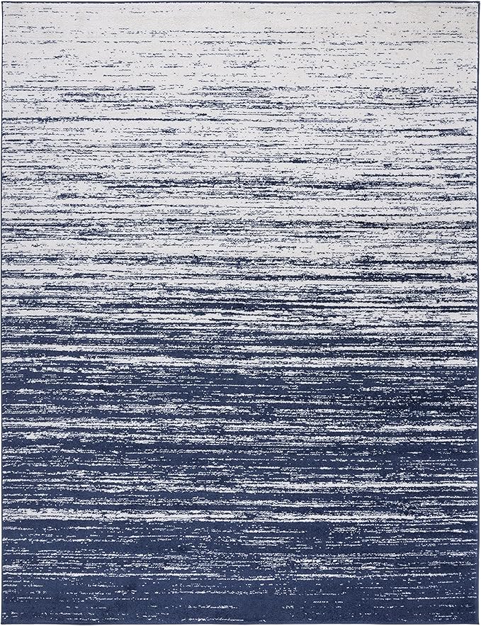 SAFAVIEH Adirondack Collection Area Rug - 5'5" x 7'7", Navy & Ivory, Modern Ombre Design, Non Shedding & Easy to Clean, Ideal for Living Room, Bedroom, Office, Dining Space (ADR113N)
