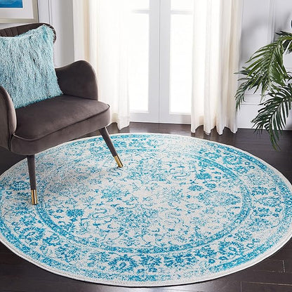 SAFAVIEH Adirondack Collection Area Rug - 4' Round, Ivory & Teal, Distressed Vintage Floral Design, Non-Shedding & Easy to Clean, Ideal for Living Room, Bedroom, Dining Space (ADR109D)